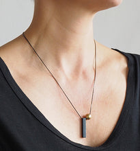 Load image into Gallery viewer, Black Bar + Brass Ball Necklace
